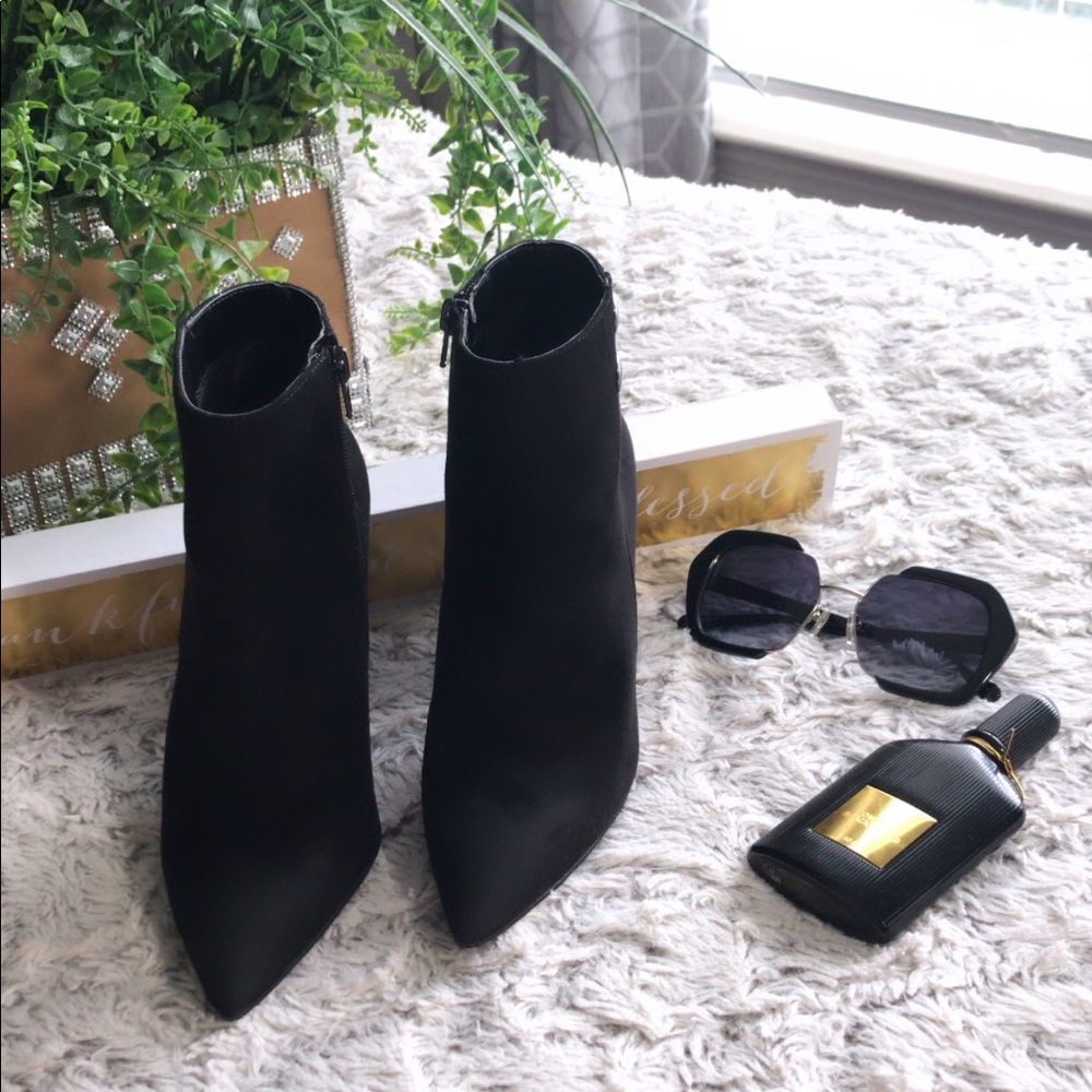 BCBG black heeled booties size 7. Brand new.